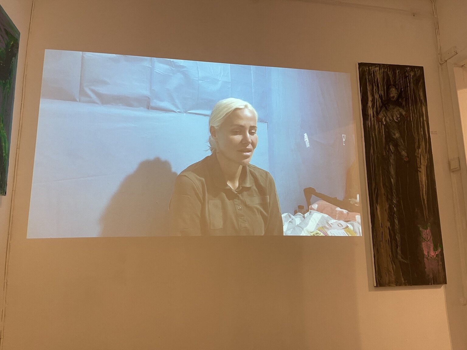 Video projection and artwork at the exhibition