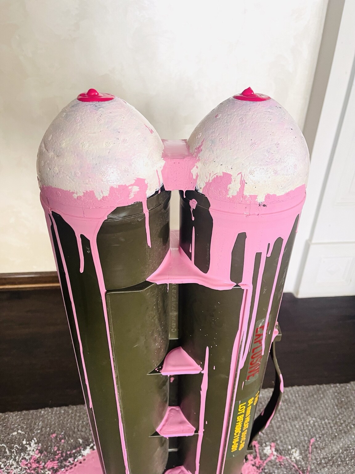Breasts installation made from ammunition containers